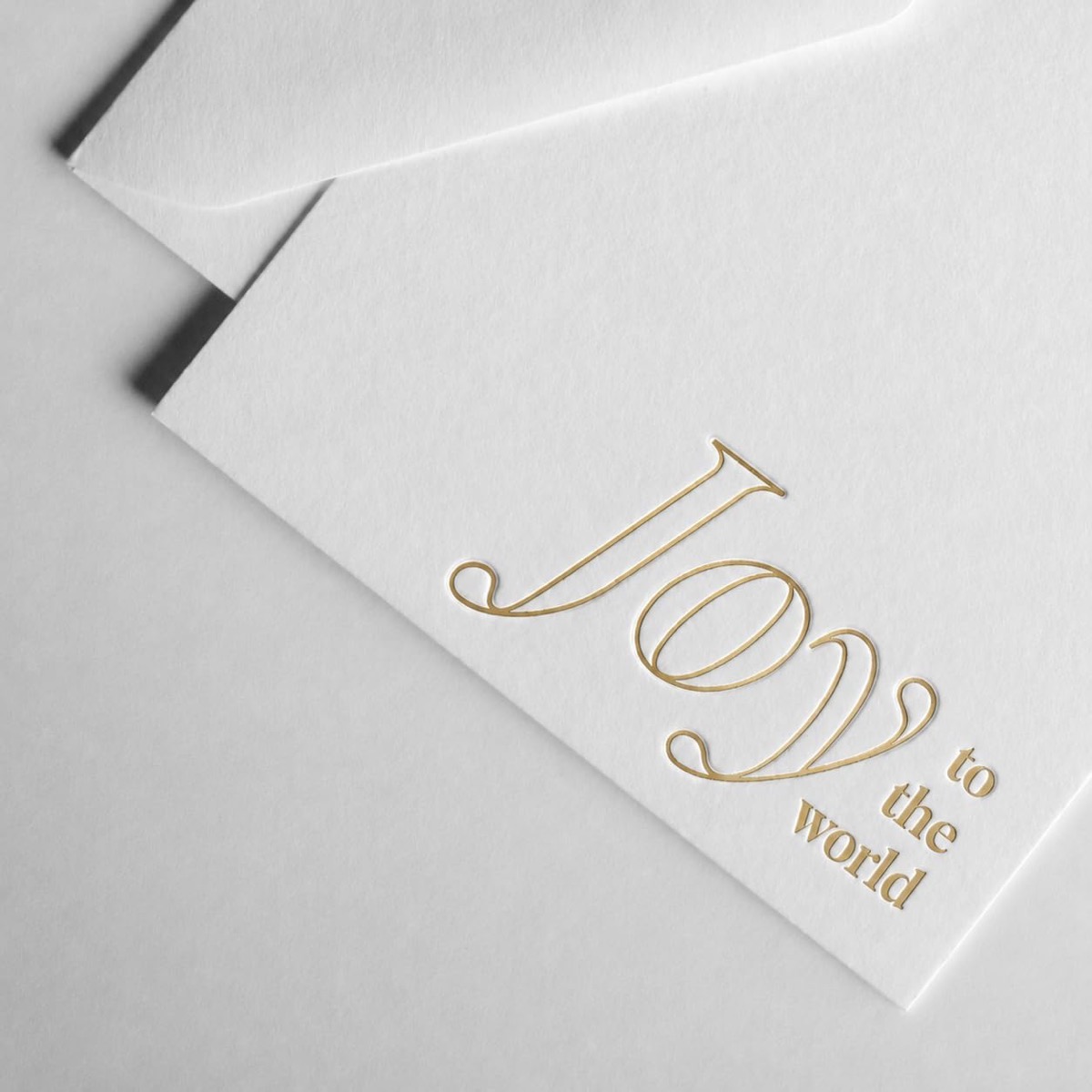 Joy to the World note card with a handwritten message